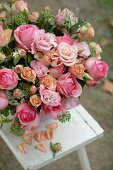 Bunch with pink roses outdoors