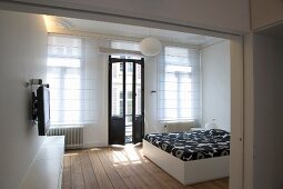 Minimalist bedroom in traditional interior