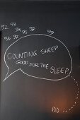 Counting sheep - tip for nodding off written on blackboard wall
