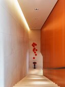 Modern staircase with orange accents