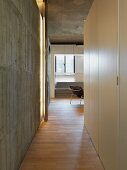 Hallway with hardwood floor in modern home