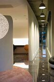 Marble hallway with pendant lights