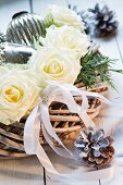 Christmas flower arrangement of white roses