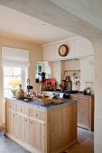 Rustic style, kitchen unit with unfinished wooden bases in a modern country home kitchen