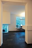 Open-plan living-dining room with Norwegian slate floor