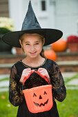 Girl dressed as witch