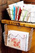 Colourful stationary in wire baskets