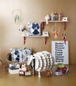 Christmas gifts for animal-lovers: feeding bowls, dog basket, animal figurines, dog lead, decorative cardboard sheep, scatter cushions