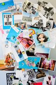 Collection of postcards and photos on pin board