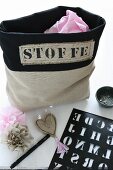 Hand-made bag with stencilled lettering