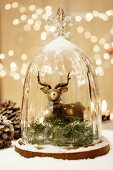 Deer ornament under glass cover