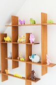 Cardboard animal ornaments on quirky shelving system