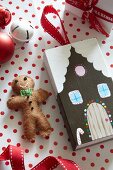 Felt gingerbread man and house made from matchbox