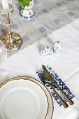 Traditional place setting with cruet and candlestick