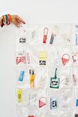 Holiday souvenirs sewn into plastic pouches