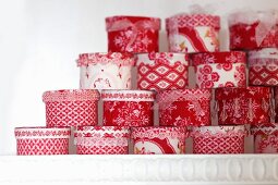 Advent calender made from tins covered in fabric and trim