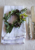 Small herb wreath decorating napkin