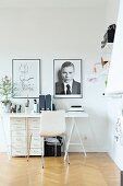 White, Scandinavian engineered wood chair at desk with filing cabinets below