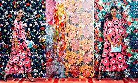 Young woman in a flower dress in front of different strips of wallpaper with different floral motifs