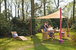 Hand-made mobile awning in garden