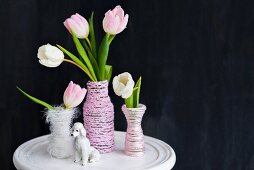 Tulips in vases covered in cord and poodle ornament