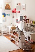 Toy shop and kitchen in child's bedroom