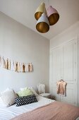 Accessories in delicate shades in bedroom