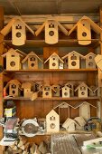 Bird nesting boxes and cases for cuckoo clocks in traditional workshop