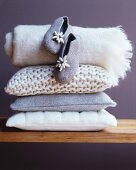 Cosy cushions, blanket and felt slippers