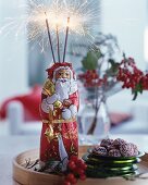 Chocolate Father Christmas decorated with sparklers