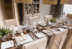Elegant African decorations on table set for Christmas dinner