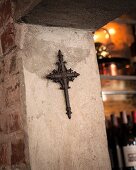 Wrought iron cross in stone doorway, Restaurant Charango, Cape Town, South Africa