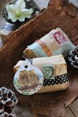Gifts wrapped using unusual washi tapes, gift tags and stamps