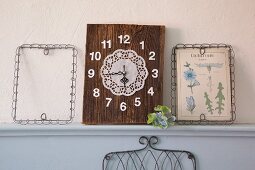 Clock made from old piece of wood, numbers and doily