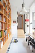 Shelving and white floor in study