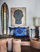 Ethnic living room with masonry bench and patterned cushions