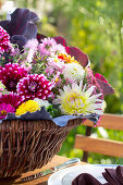 Autumn bouquet of cabbage leaves, hydrangeas, asters and dahlias