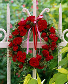 Wreath of roses and raspberries
