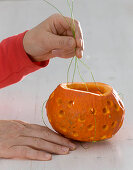 Pumpkins as lanterns in the window