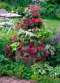 Barrel tower planted with balcony flowers