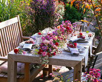 Table decoration with asters and roses