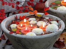 Floating candles and floating flowers of chrysanthemum