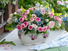 Rose forget-me-not arrangement in rose jardiniere