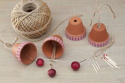 Homemade bells made of small clay pots