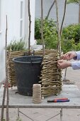 Decorate planter with homemade wicker elements