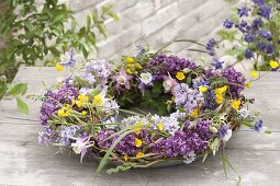 Colorful mixed wreath, with Syringa, Pulmonaria