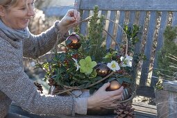 Winterfest planted copper bowl on wooden bench