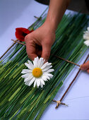 Making table runners out of barley and daisies