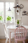 Sunny dining room in Scandinavian, country-house style