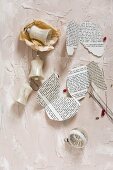 Vintage Christmas-tree decorations and wings made from book pages